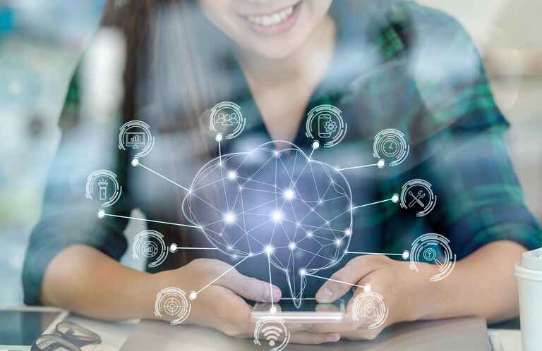 A smiling woman uses a smartphone with a digital brain graphic and various technology icons overlaid, representing connections and networked data.