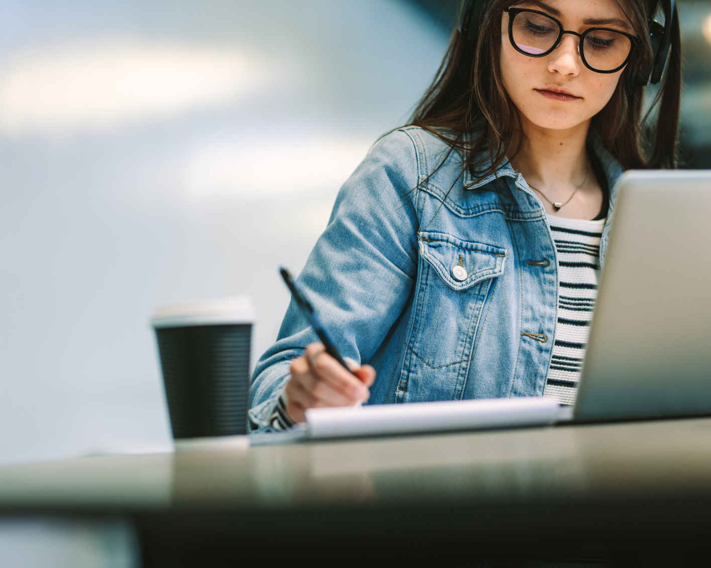 University student studying at library