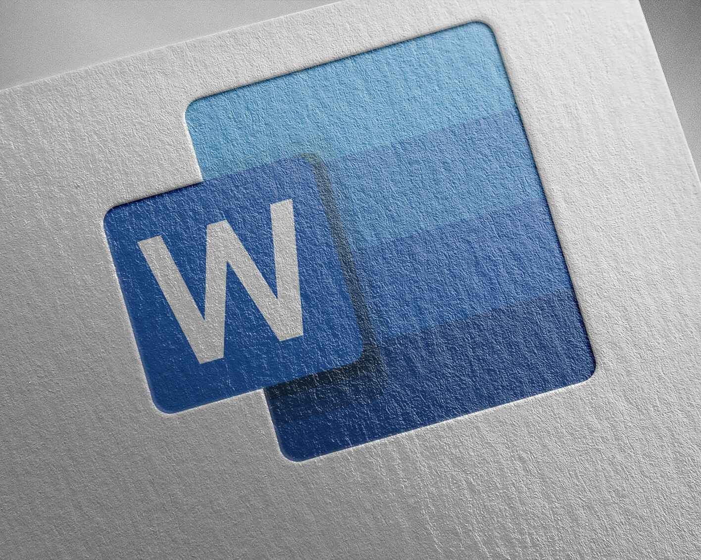 Close-up of a Microsoft Word logo on a textured paper background, featuring a blue gradient square with a white ‘W’ in the center.