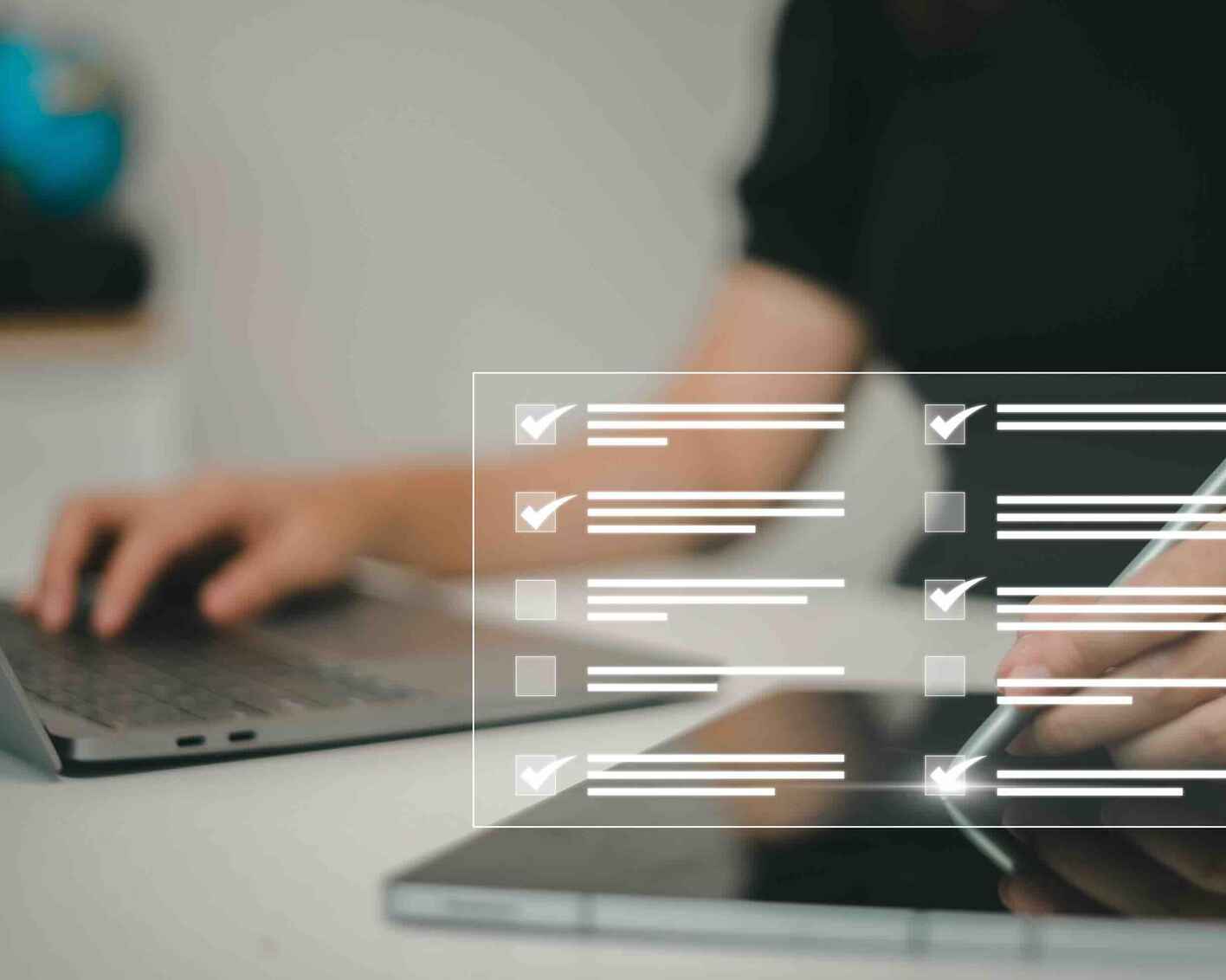 Person using tablet and laptop with checklist overlay