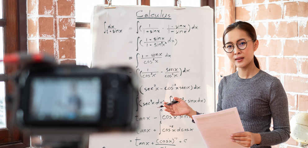 Asian woman teacher teaching lesson online learning via internet at home